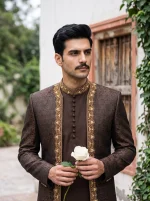 Men's Royal Chocolate Brown Jamawar 3-Piece Sherwani with Handmade Golden Embroidery on Collar and Front Borders, Paired with Matching Kurta and Trousers, Perfect for Groom Wedding Wear.