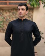 Traditional South Asian black kurta for men